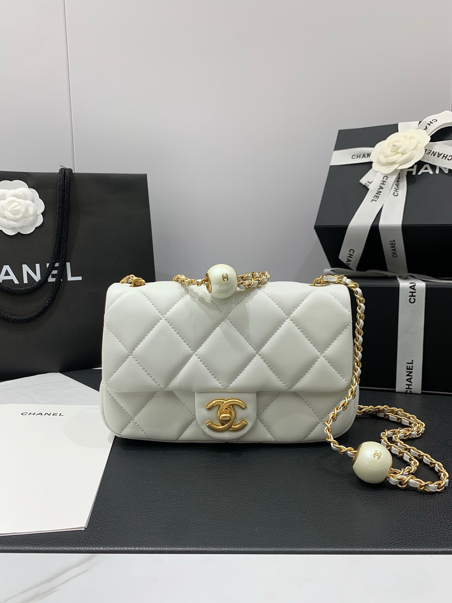 CHANEL  24S  MINI FLAP BAG Lambskin, Imitation Pearls & Gold Metal white