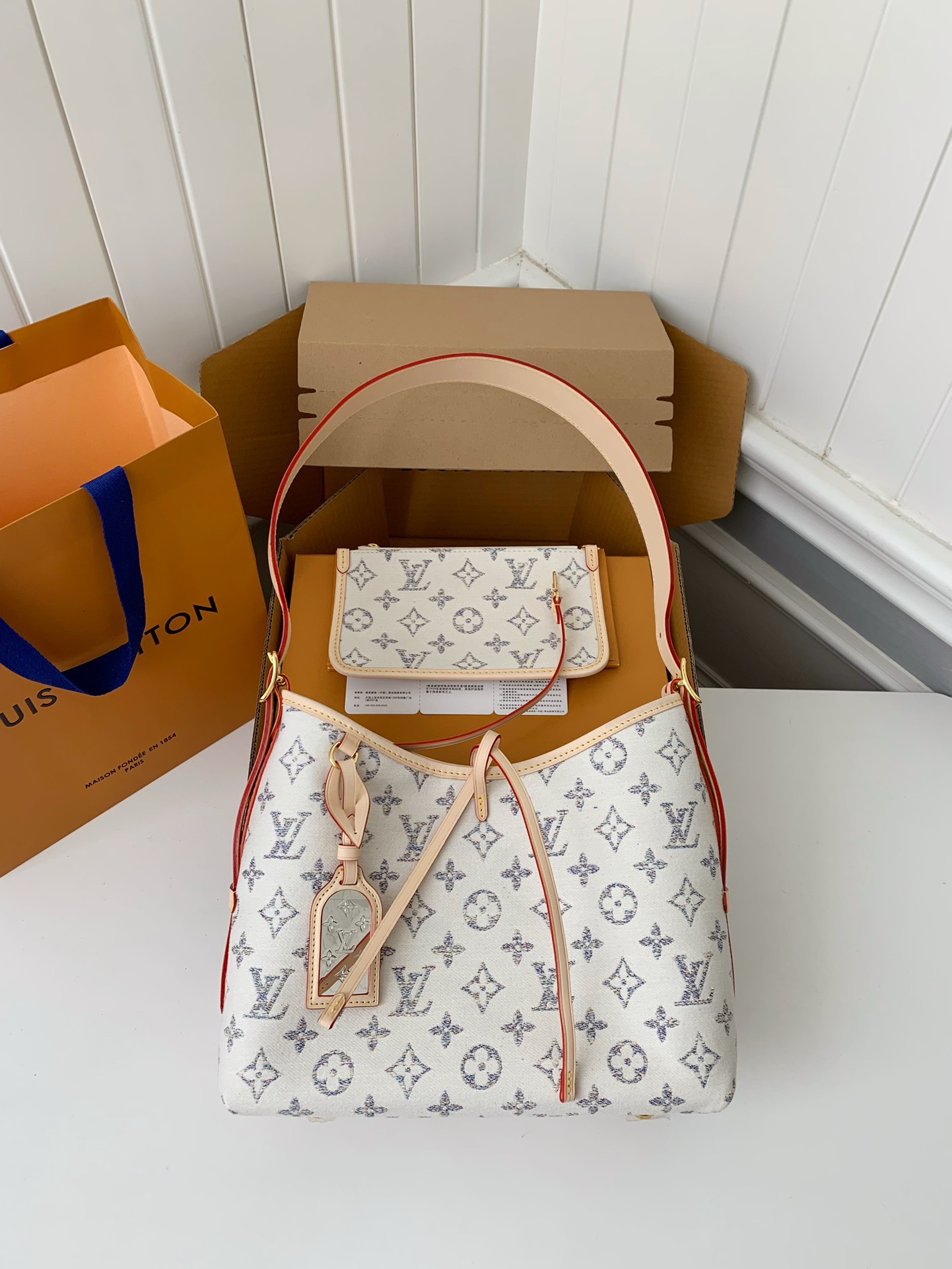 Louis Vuitton® CarryAll PM 