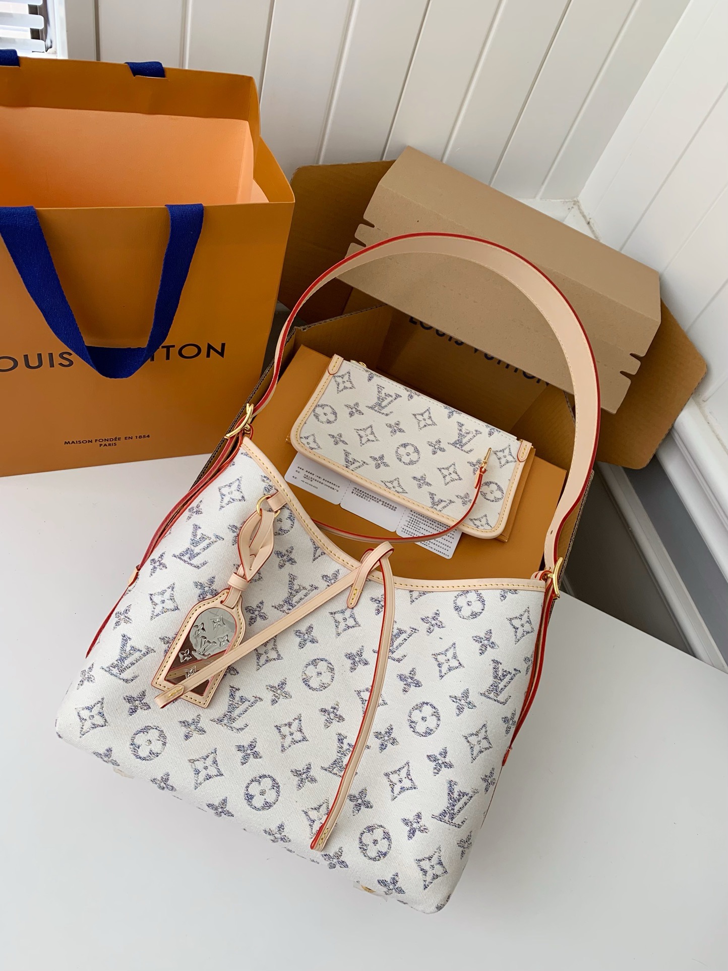 Louis Vuitton® CarryAll PM 